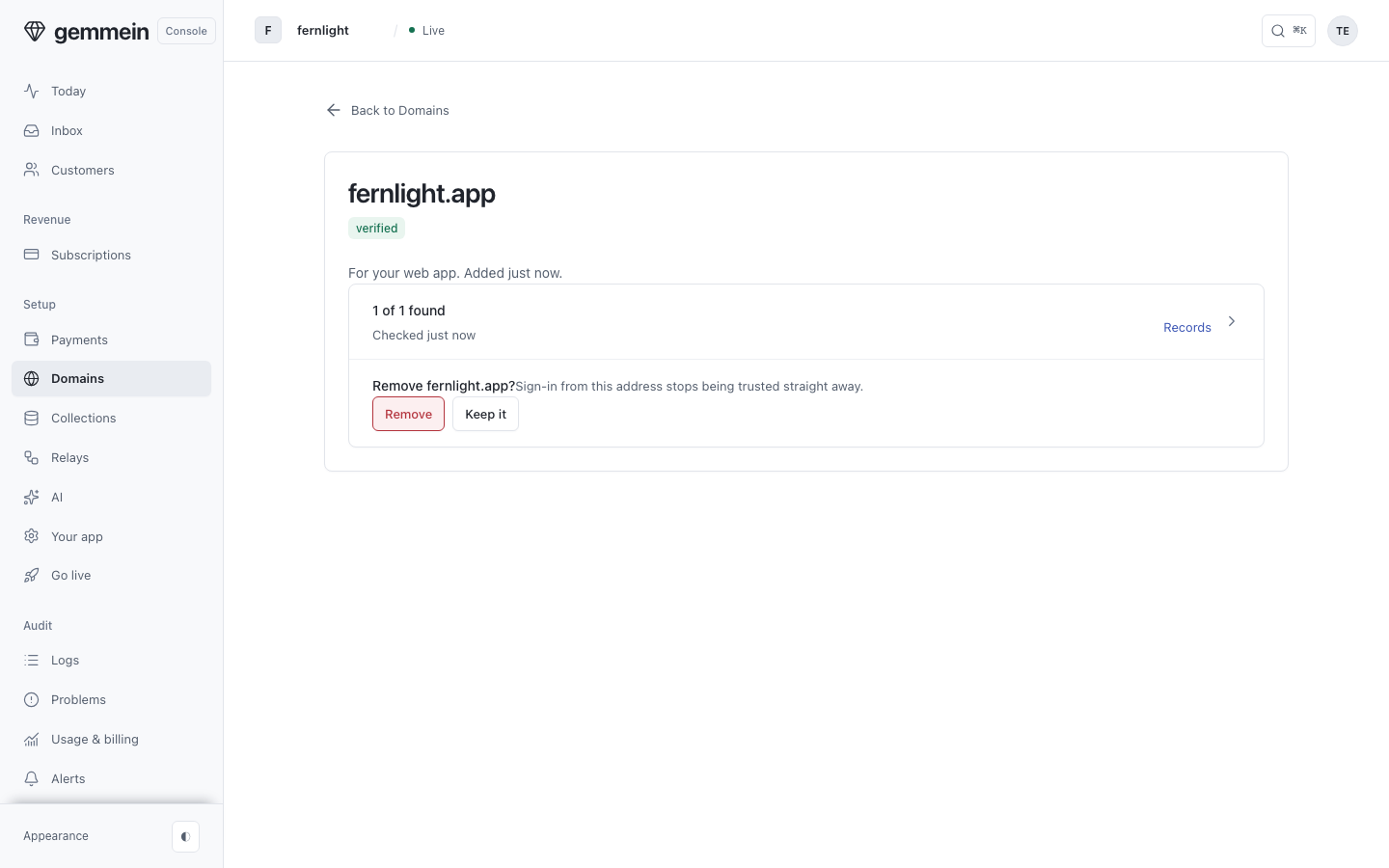 Choose Remove to take a domain off your app; it asks first, and nothing is deleted at your DNS provider.
